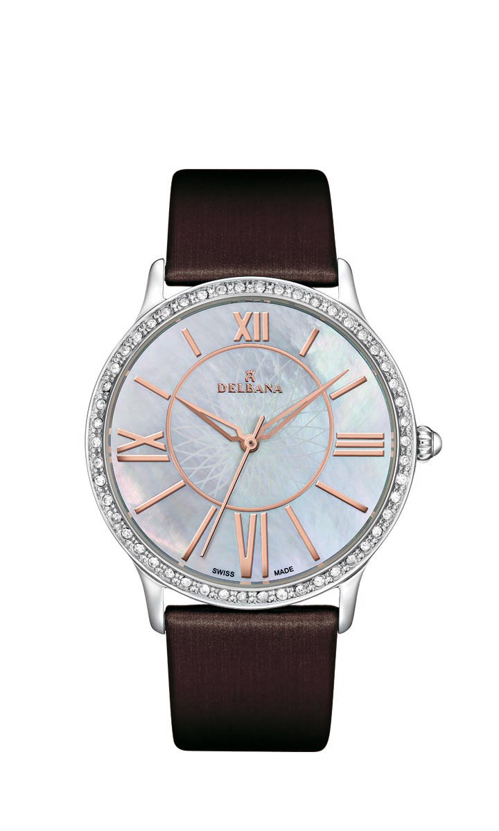 Delbana Paris. Classic ladies' watch with stainless steel case set with 50 Swarovski crystals. White mother of pearl, floral guilloche pattern dial. Hazelnut brown satin finish genuine leather strap. Water resistant to 5 ATM / 50 meters / 165 feet.