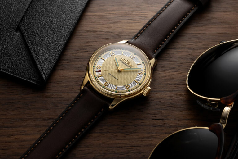 DELBANA Recordmaster Mechanical in yellow gold PVD with champagne dial, silver micro grooves and brown, hand-made Italian leather strap.